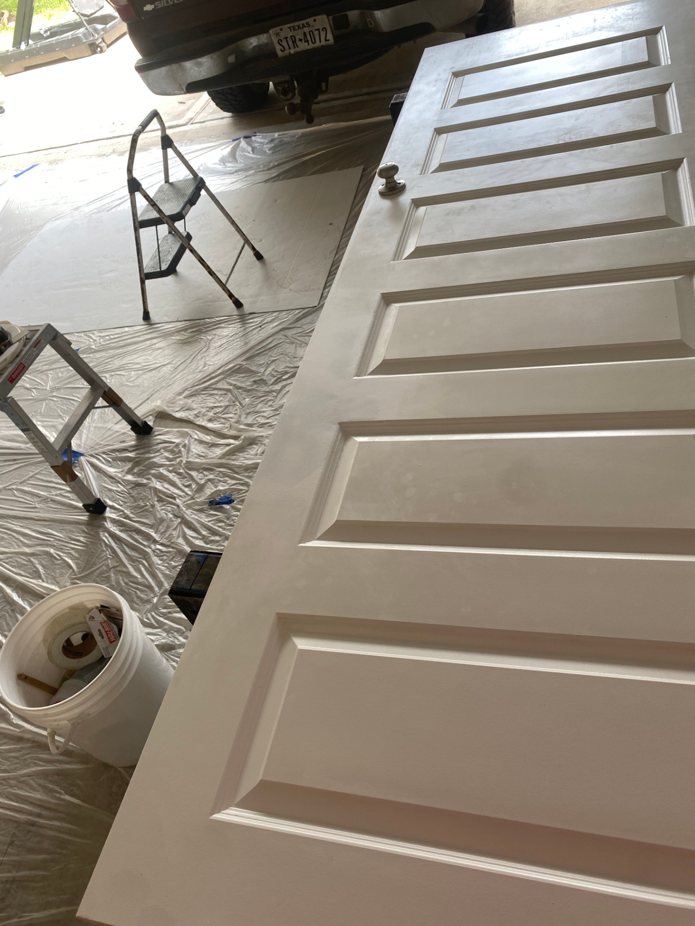 Close-up of a freshly painted interior door during finishing work